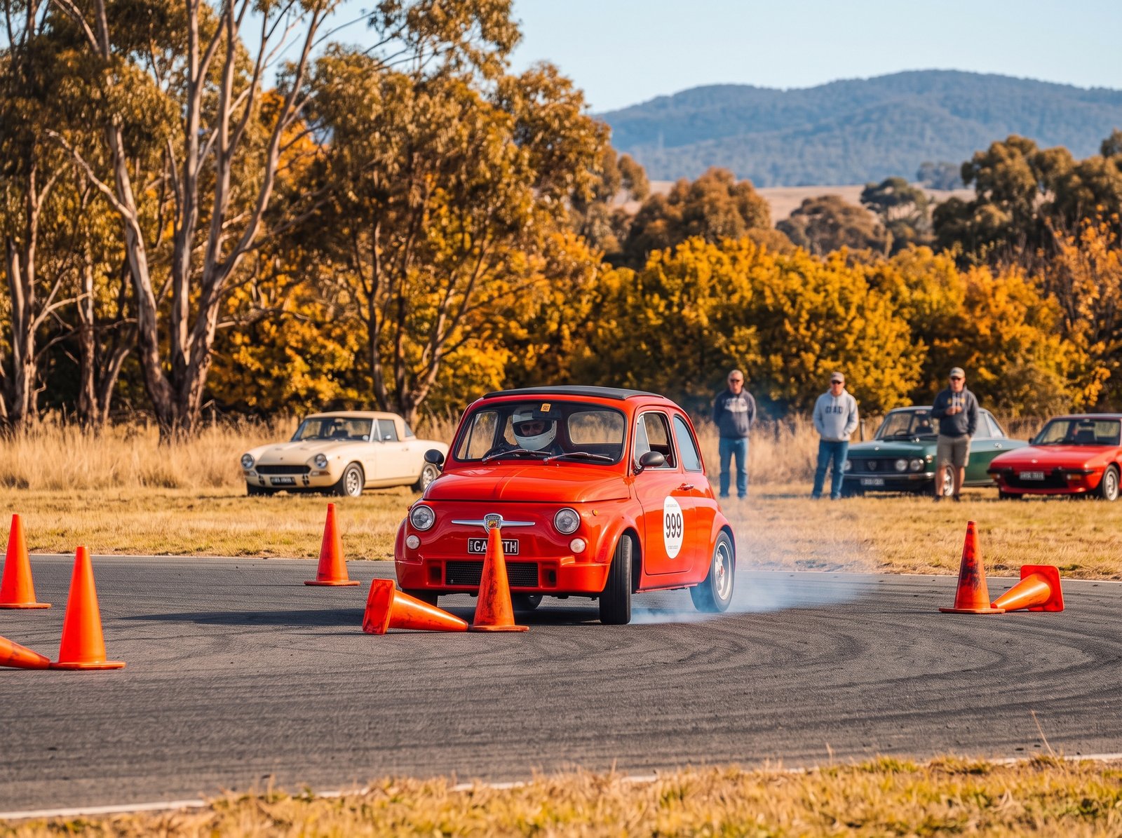 A Fiat threading through a Motorkhana course of cones