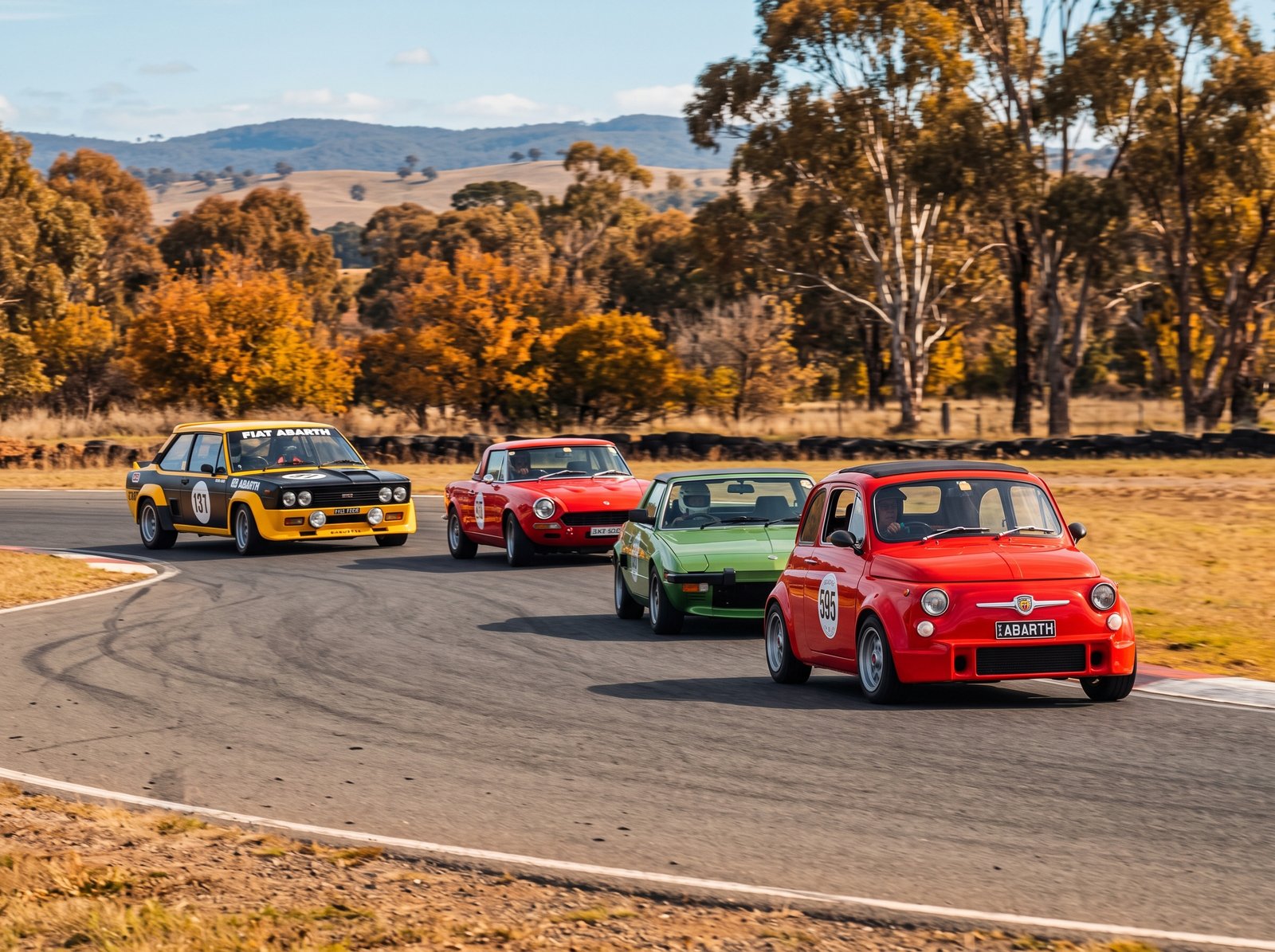 Classic Fiats and Abarths competing on track